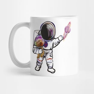 Astronaut and Cavapoo puppy dog in Space suit reaching  out to touch Saturn’s ring - cute Cavoodle, Cavapoo, Cavalier King Charles Spaniel Mug